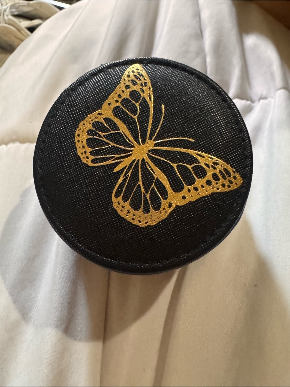 Compact Black Jewelry Organizer with Gold Butterfly Accent